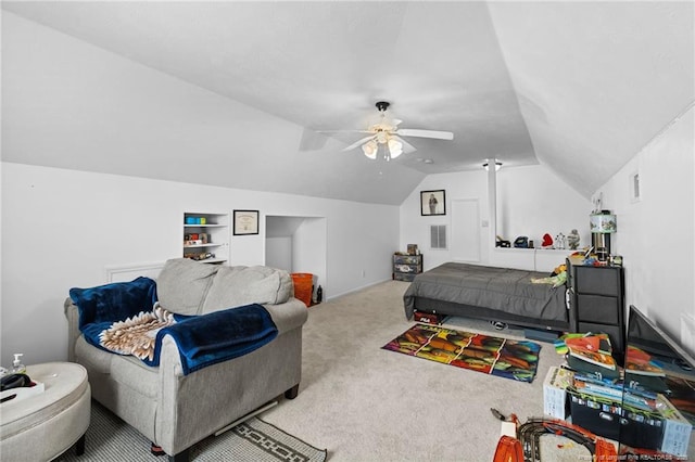 bedroom featuring carpet floors, lofted ceiling, visible vents, and ceiling fan