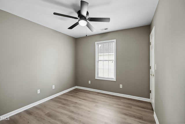 131 Cricketgrass Dr, Cary, NC 27513 - empty room featuring a ceiling fan, baseboards, and wood finished floors