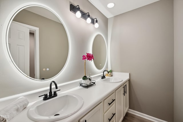 131 Cricketgrass Dr, Cary, NC 27513 - full bath featuring double vanity and baseboards