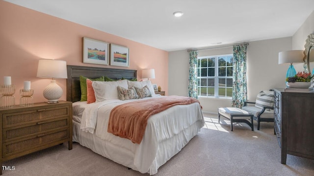 bedroom with light carpet