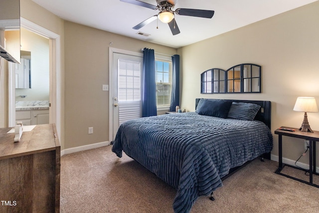 carpeted bedroom with ceiling fan, visible vents, and baseboards