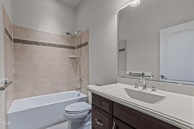 bathroom featuring vanity, bathing tub / shower combination, and toilet