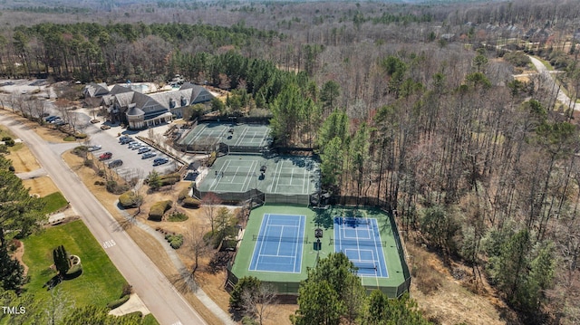 aerial view featuring a wooded view