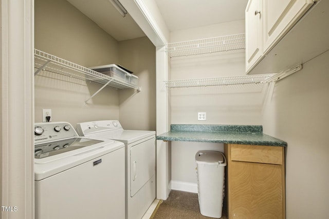 clothes washing area featuring washer and dryer