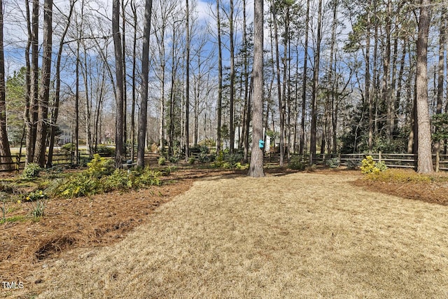 view of yard with fence