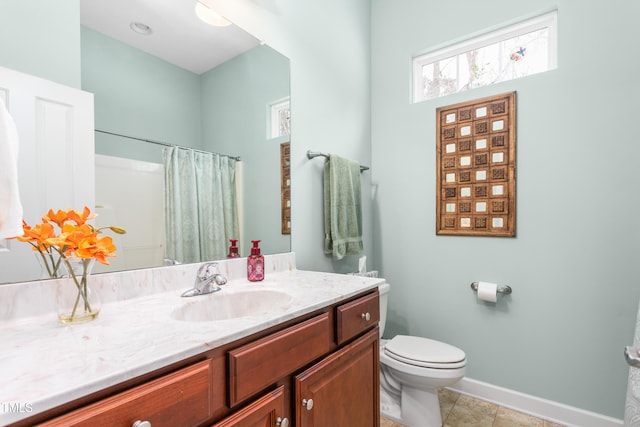 full bathroom with a shower with shower curtain, toilet, vanity, baseboards, and tile patterned floors