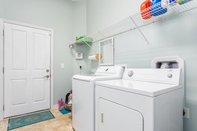 laundry room featuring laundry area and independent washer and dryer