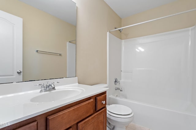 full bathroom with shower / bathtub combination, toilet, vanity, and tile patterned flooring