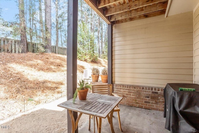 view of patio with fence and area for grilling