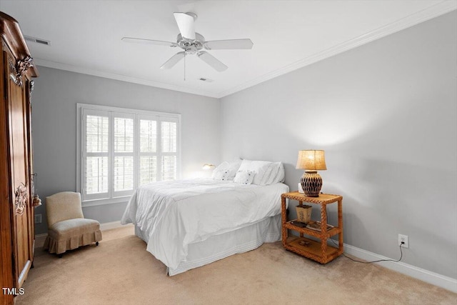 bedroom with light carpet, visible vents, baseboards, a ceiling fan, and crown molding