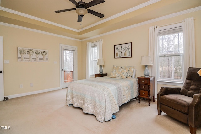 bedroom featuring carpet, a raised ceiling, ornamental molding, access to outside, and baseboards