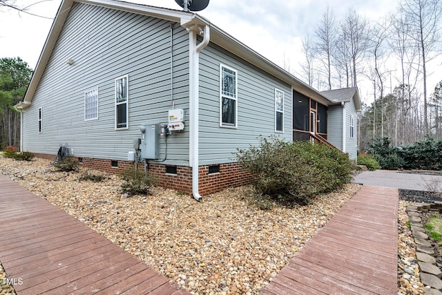 view of home's exterior featuring crawl space