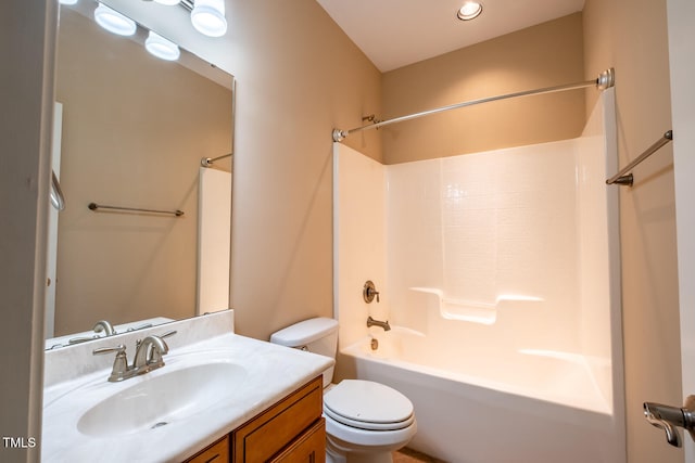 bathroom with shower / bath combination, vanity, and toilet