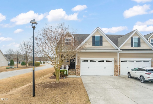 view of front of home featuring a garage and concrete driveway