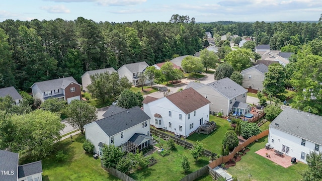 bird's eye view with a residential view and a forest view