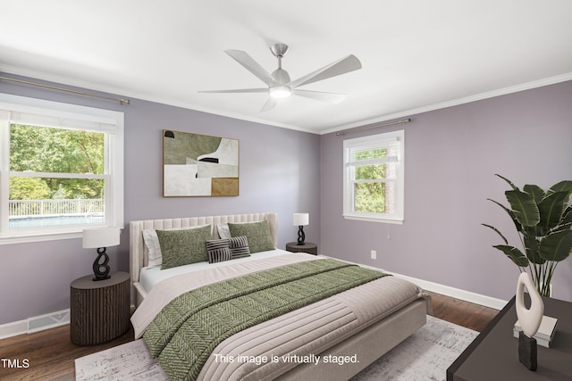 2120 Hillock Dr, Raleigh, NC 27612 - bedroom featuring ornamental molding, wood finished floors, and ceiling fan
