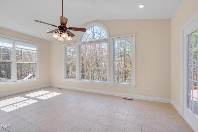 interior space featuring visible vents, ceiling fan, and lofted ceiling