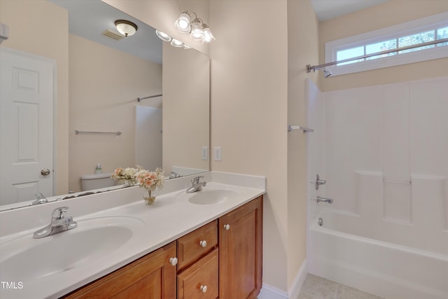 full bath featuring shower / tub combination, toilet, visible vents, and a sink