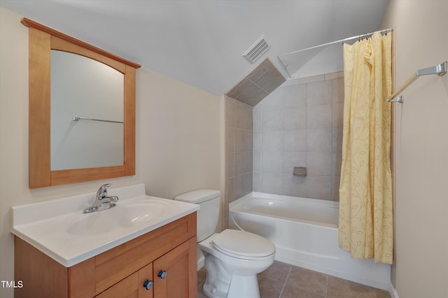 bathroom featuring vanity, visible vents, shower / tub combo, tile patterned floors, and toilet