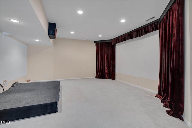 cinema room with recessed lighting, visible vents, carpet floors, and baseboards