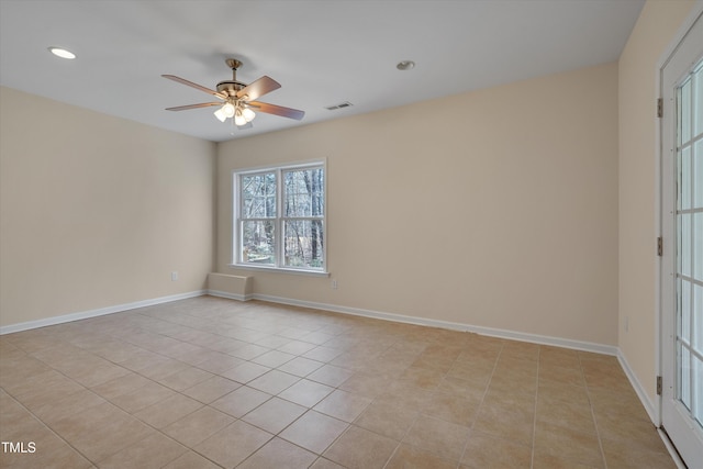 spare room featuring visible vents, baseboards, light tile patterned floors, recessed lighting, and a ceiling fan