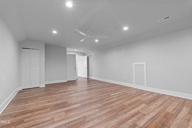 empty room featuring ceiling fan, light wood-style flooring, visible vents, and recessed lighting