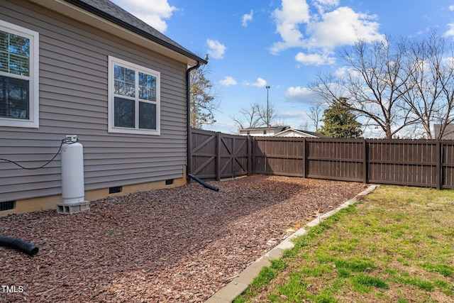 view of yard featuring a fenced backyard