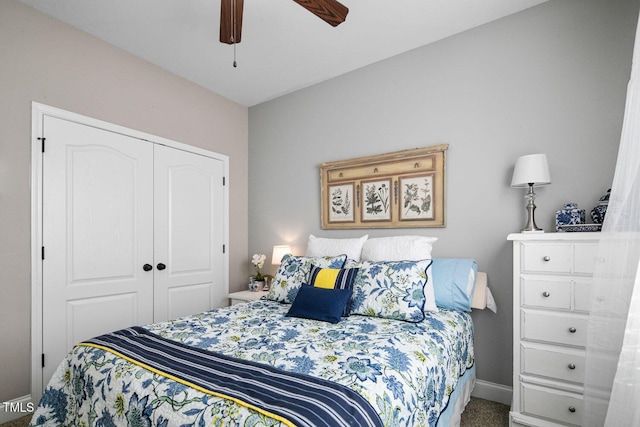 carpeted bedroom with a ceiling fan, a closet, and baseboards