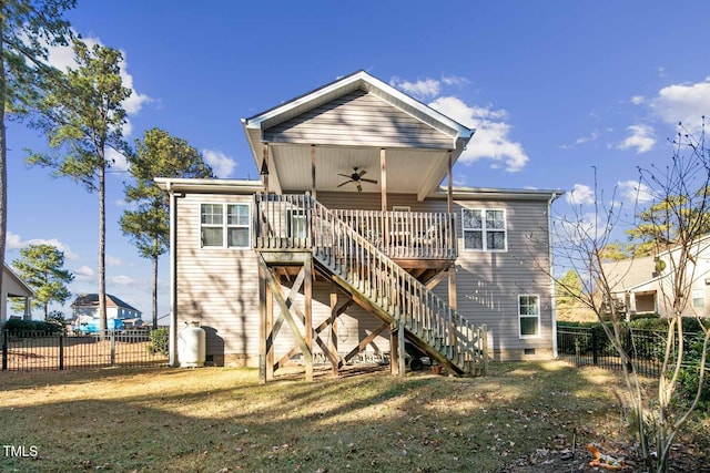 back of house featuring a ceiling fan, a fenced backyard, stairway, crawl space, and a wooden deck