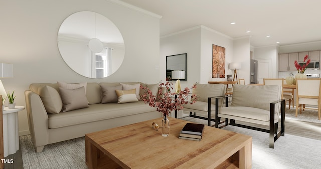 living area with recessed lighting and crown molding