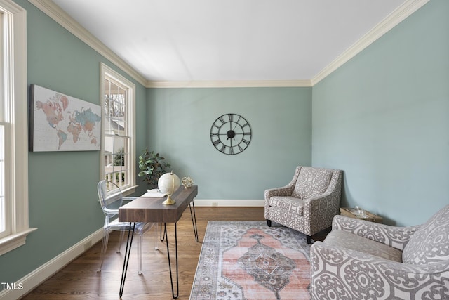 home office featuring crown molding, wood finished floors, and baseboards