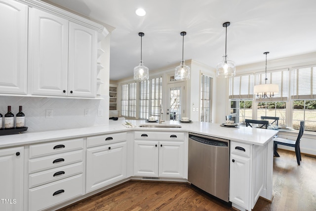 kitchen featuring a sink, open shelves, dishwasher, a peninsula, and dark wood-style flooring