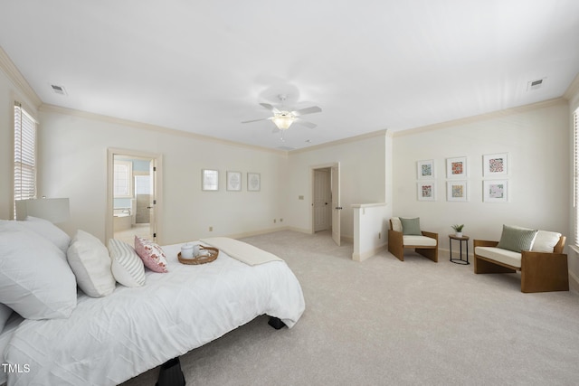 bedroom with visible vents, light colored carpet, baseboards, and ornamental molding