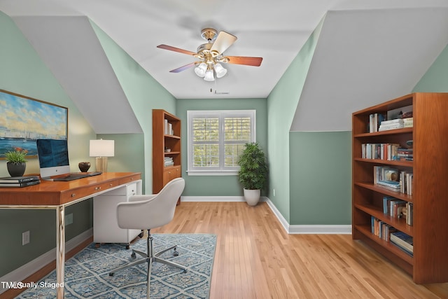 office space with ceiling fan, baseboards, and wood finished floors