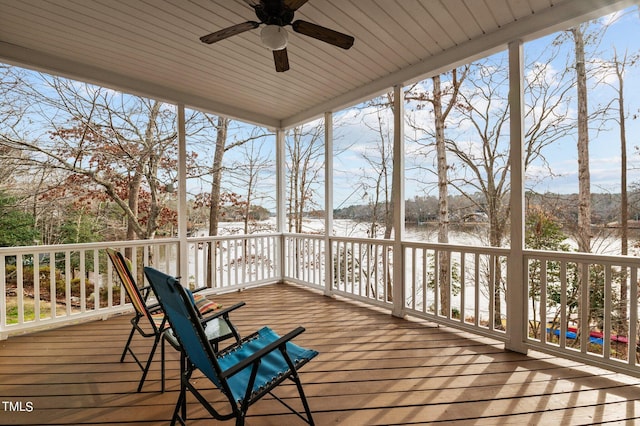 unfurnished sunroom with a wealth of natural light and a water view