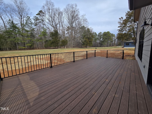 deck featuring a lawn