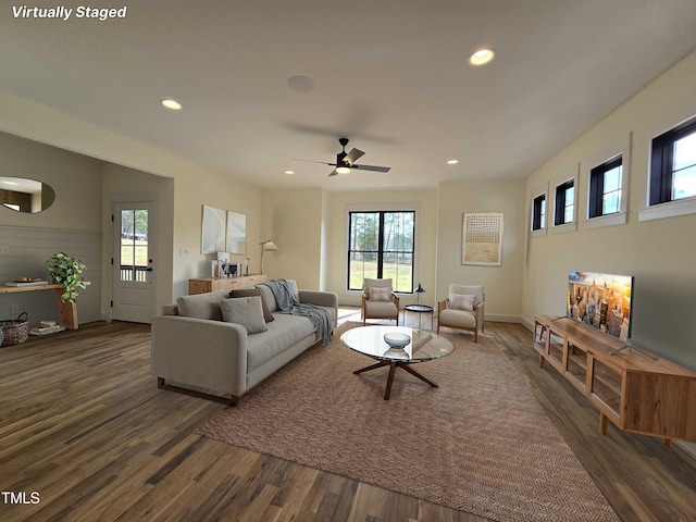 living area featuring wood finished floors, recessed lighting, and a ceiling fan
