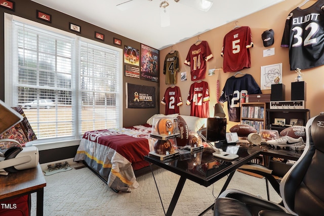 carpeted bedroom featuring ceiling fan