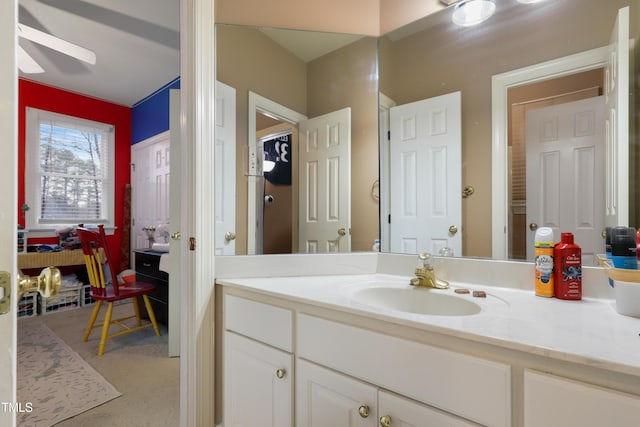 bathroom with vanity and a ceiling fan