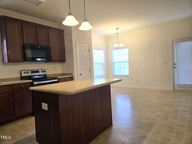 kitchen with black microwave, a kitchen island, light countertops, hanging light fixtures, and stainless steel range with electric stovetop