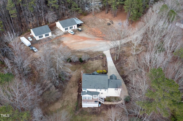 drone / aerial view with a forest view
