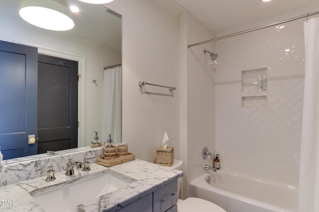 full bath with toilet, visible vents, shower / tub combo with curtain, and vanity