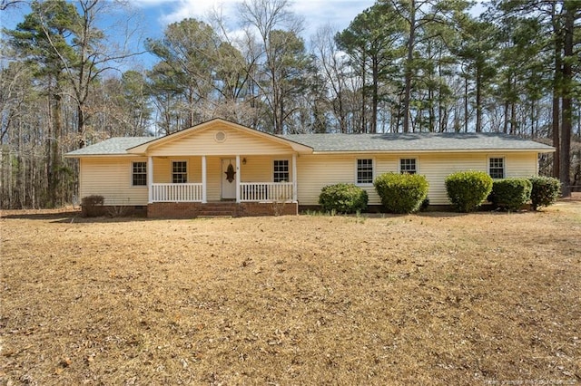 single story home featuring crawl space and covered porch