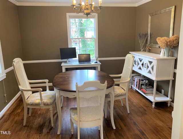 dining space with a chandelier, ornamental molding, wood finished floors, and baseboards