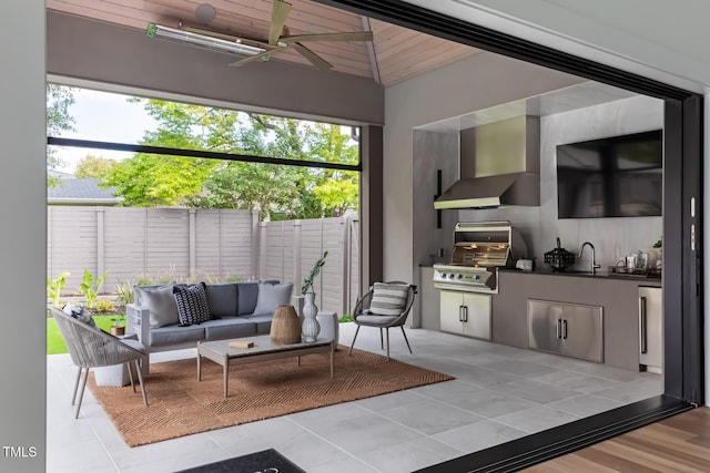 living room with light tile patterned floors and ceiling fan