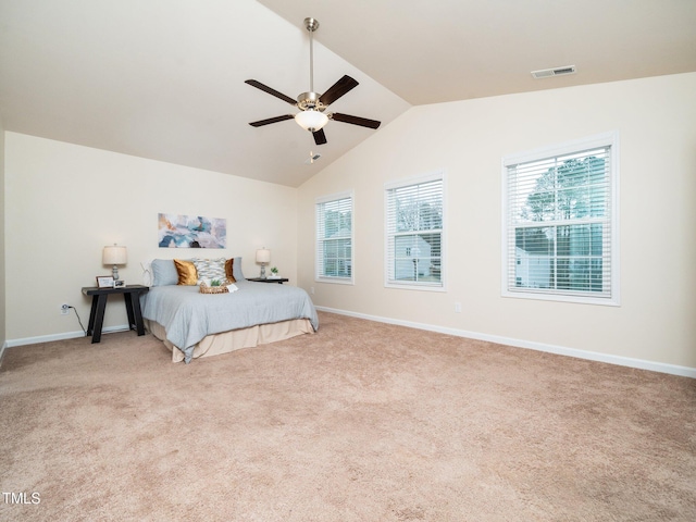 carpeted bedroom with a ceiling fan, visible vents, vaulted ceiling, and baseboards