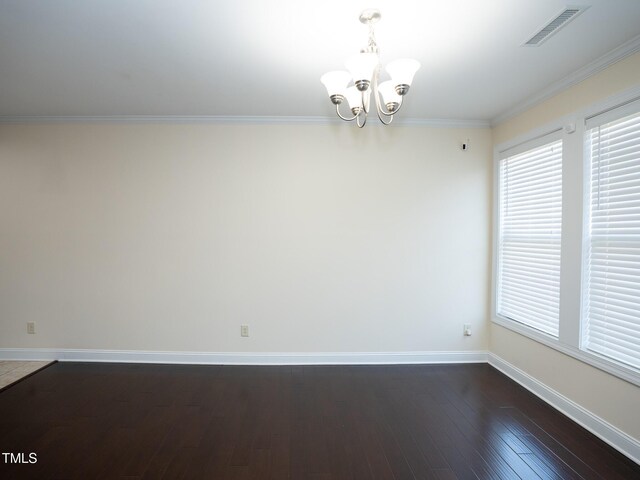 4137 Strendal Dr, Cary, NC 27519 - empty room featuring crown molding, a notable chandelier, dark wood finished floors, baseboards, and visible vents