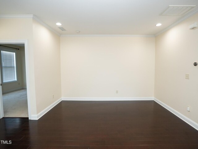 4137 Strendal Dr, Cary, NC 27519 - unfurnished room with recessed lighting, baseboards, ornamental molding, and dark wood-type flooring