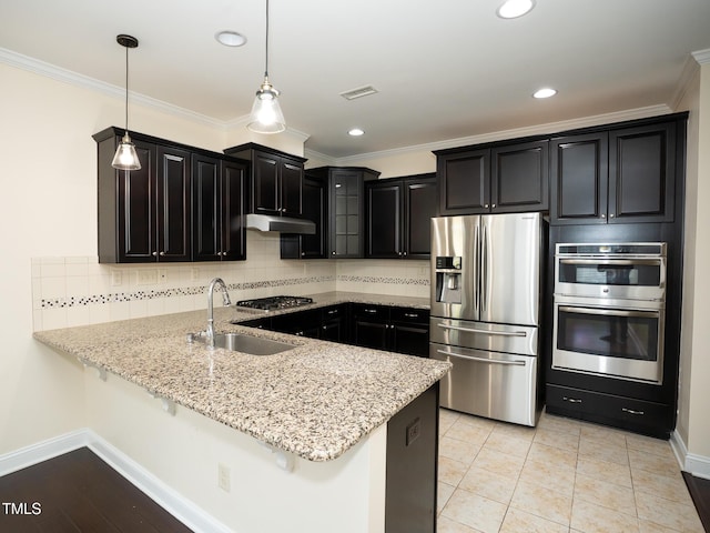 4137 Strendal Dr, Cary, NC 27519 - kitchen with appliances with stainless steel finishes, a sink, dark cabinetry, a peninsula, and visible vents