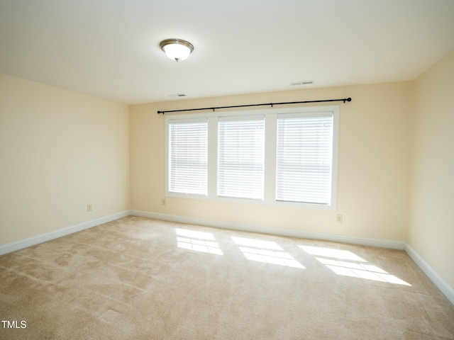 4137 Strendal Dr, Cary, NC 27519 - carpeted spare room featuring baseboards, visible vents, and a wealth of natural light